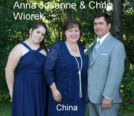 Chris and Anne working in Asia
